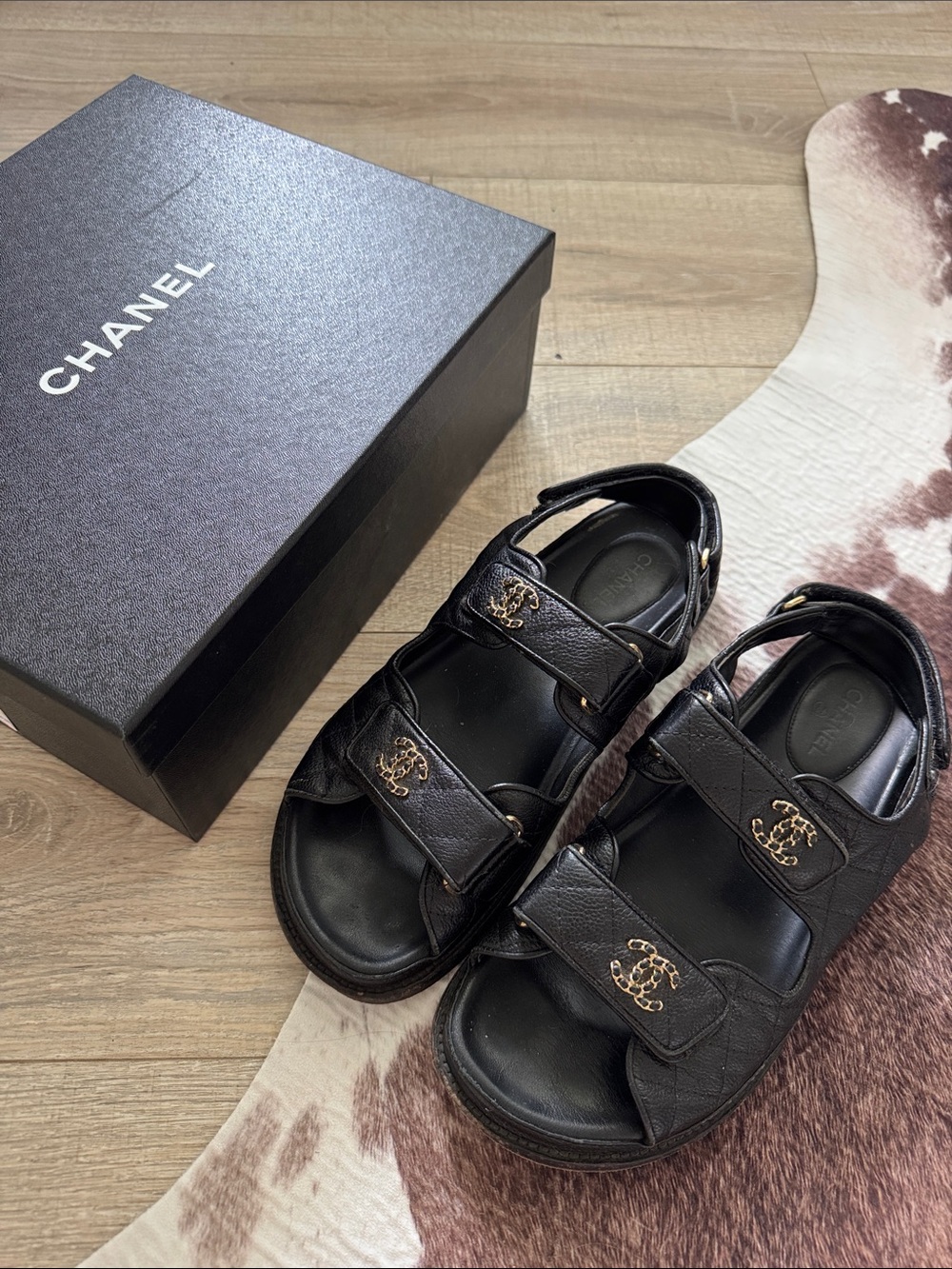 CHANEL Black Leather Sandals with Gold CC Emblems